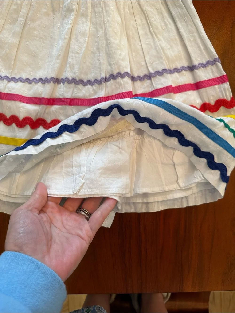 Mini Boden White Pinafore jumper with Rainbow Ric-Rac Trim size 4-5